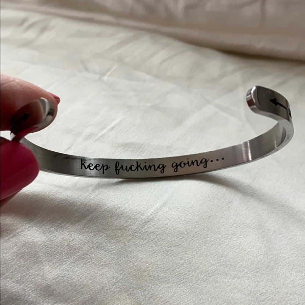 COPY - Silver bracelet w/ “keep fucking going” on inside